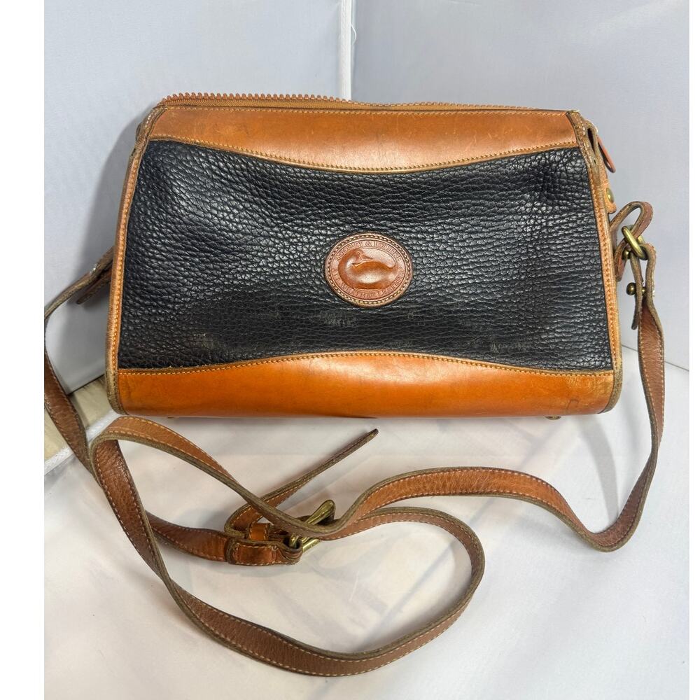 Vintage Dooney & Bourke Leather navy and tan crossbody bag. ** see condition